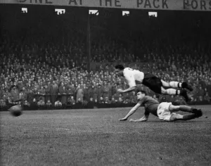 Heading Prints: Legendary centre-forward Nat Lofthouse with Bolton Wanderers in action July 1957