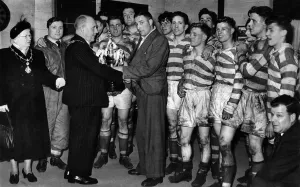Leigh Captain A. Stone receives the Lancashire combinations cup from Mayor of Leigh