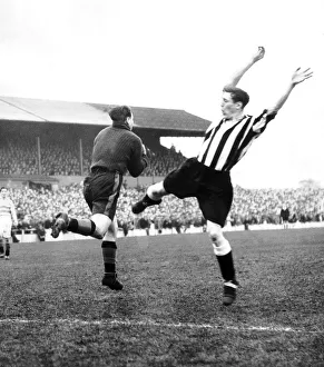 00230 Prints: Len Shackleton of Newcastle (right) is beaten to the ball by Doncaster goalkeeper