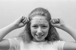 Lena Zavaroni wears a Daily Mirror Pop Club T-Shirt and a Daily Mirror Pop Club Pendant
