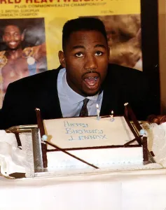 Lennox Lewis Boxer with his Birthday cake during a press conference for the upcoming