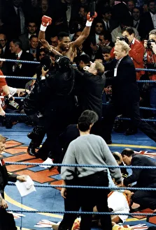 Lennox Lewis Boxing Heavyweight Boxer surrounded by his corner men
