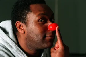 Lenny Henry Comedian December 1997 Wearing red nose for Red Nose Day