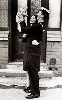 Leonard Perrigo with his wife and son in Birkenhead Sailor holding his baby boy
