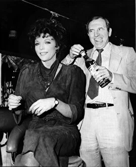 Images Dated 18th November 1983: Leonard Rossiter actor with Joan Collins in Cinzano advert