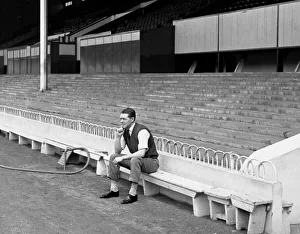 Alone Prints: Les Allen of Tottenham Hostpur sitting alone in the ground at White Hart Lane May