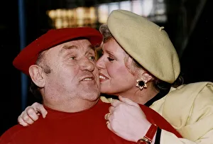 00362 Prints: Les Dawson Comedian with wife having a cuddle after leaving Hospital