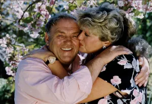 Les Dawson comedian with his wife Tracey celebrating their first wedding