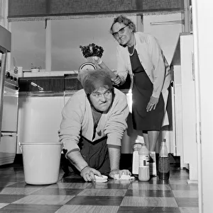 01521 Prints: Les Dawson lends a hand at his mother-in-laws house in Unsworth, near Bury