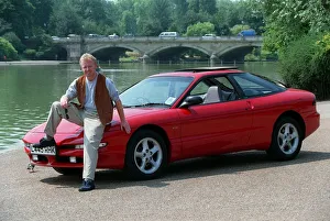 Les Dennis Comedian / TV Presenter December 97 Sitting on the bonnet of the new Ford