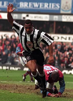 Les Ferdinand of Newcastle United celebrates after scoring against Aston Villa at St