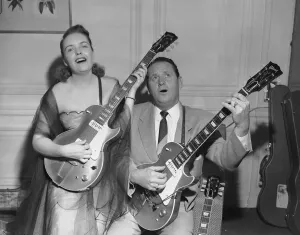 Les Paul singer, songwriter, guitarist & inventor pictured [performing with wife Mary