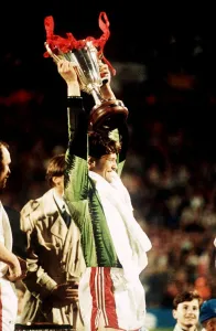 Les Sealey Manchester United goalkeeper holding aloft the European Cup Winners Cupafter