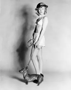 Lesley Duff Actress modeling with sausage dog on the lead dbase