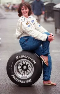 LESLEY FITZ SIMONS TAKE THE HIGH ROAD ACTRESS SITTING ON A BRIDGESTONE TYRE