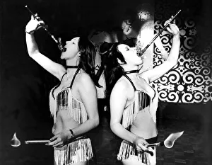 00090 Prints: Lesley Hamilton and Gina Beck, a go-go dancer and fire eating act has won them a place in