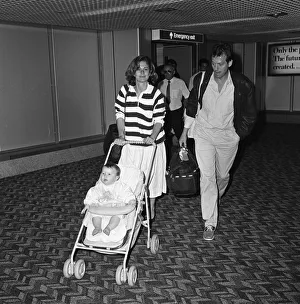 01187 Prints: Leslie Grantham at LAP with his wife Jane and their baby. 24th June 1987