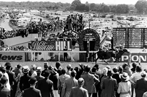 Lester Piggott jockey on The Minstrel winning the Derby in front of Hot Grove