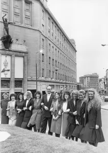 00541 Prints: Lewiss store manager David Cameron with some of the sales assistants on the day that