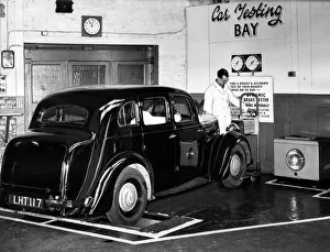 Vintage Prints: LHT 117 Motorcar has its breaks tested in a state of the art Car Testing Bay at a