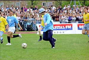 Liam Gallagher kicking football - May 1996 Oasis and Blur come head to head in