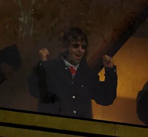 Liam Gallagher of Oasis celebrates the win May 1999 of his team Gillingham v
