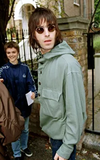 Liam Gallagher of Oasis singer leaving his London home on the day drummer Bonehead