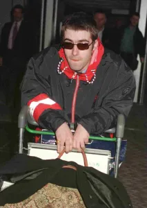 Indie Prints: Liam Gallagher of the pop group Oasis arriving at Heathrow from Paris