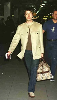 Indie Prints: Liam Gallagher Singer of Pop Group Oasis leaving Heathrow Airport for New York where he