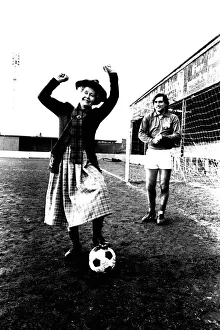 Lib - Football legend George Best giving actress Gudrun Ure some footballing tips during