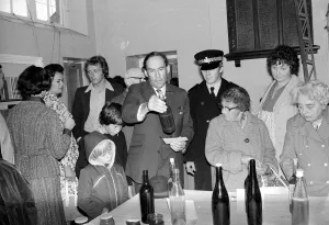 00043 Prints: Liberal Party leader Jeremy Thorpe looking at bottles as he visits a flower show