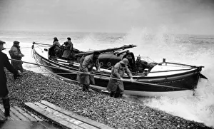 Norfolk Prints: Lifeboatmen of Sheringham, Norfolk stand by during operational flights over the North Sea