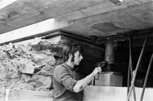 The lifting of the Old Shambles in the centre of Manchester begins with a lift of about