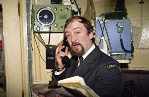 Images Dated 19th December 1992: Lighthouse keeper Colin Jones seen here radioing in a weather report during this last