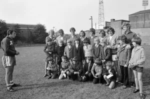 Health Prints: Lincoln City Football Club manager Graham Taylor seen here talking to the children of