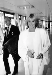 00148 Prints: Linda Evans American Actress at Heathrow Airport May 1987