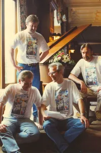 Lindisfarne band members Ray Laidlaw (centre) and Alan Hull wearing Swan Hunter campaign