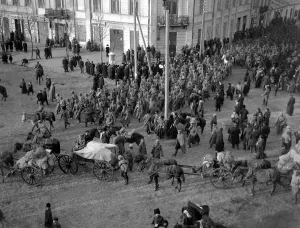 Last line of recruits called up going into action. Belgian troops marching down street