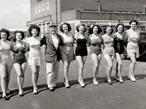 00085 Prints: A line-up of girls, women wearing swimming costumes bathing suits bikinis