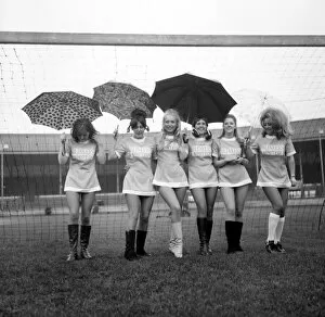 00253 Collection: Lined up in their mini soccer dresses at what should have been the time for kick-off are