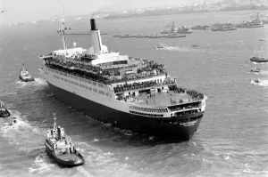 The liner QE2 departs from Southampton to take British soldiers off to war in