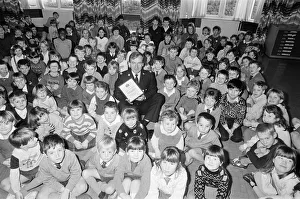 Police Officer Prints: Linthwaite Church of England School pupils being presented with a road safety certificate