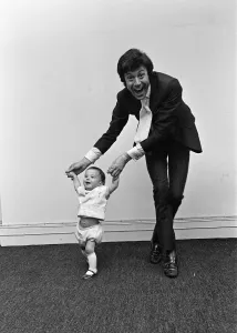 Lionel Blair giving dancing tuition to his 10-month-old son Daniel. 23rd June 1969