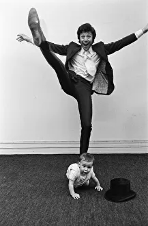 Lionel Blair giving dancing tuition to his 10-month-old son Daniel. 23rd June 1969
