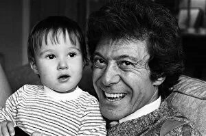 01177 Collection: Lionel Blair pictured at home with his son. 19th October 1983