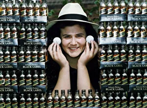 Lisa Santangeli JGT marketing holding golf balls miniatures of Johnie Walker Black Label