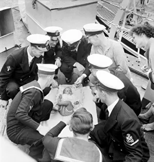 00012 Prints: Little baby girl on board the Cruiser HMS Cambria in Devonport August 1952