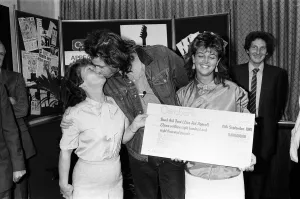 Kiss Prints: Live Aid fundraising star Bob Geldof was presented with a giant National Girobank cheque