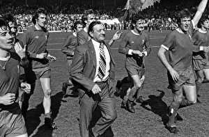 Liverpool celebrate following a 3-1 victory over QPR at Anfield put them in to second