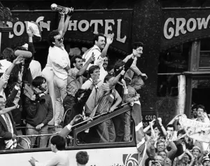 Liverpool celebrate their League Championship title success as they parade the trophy to